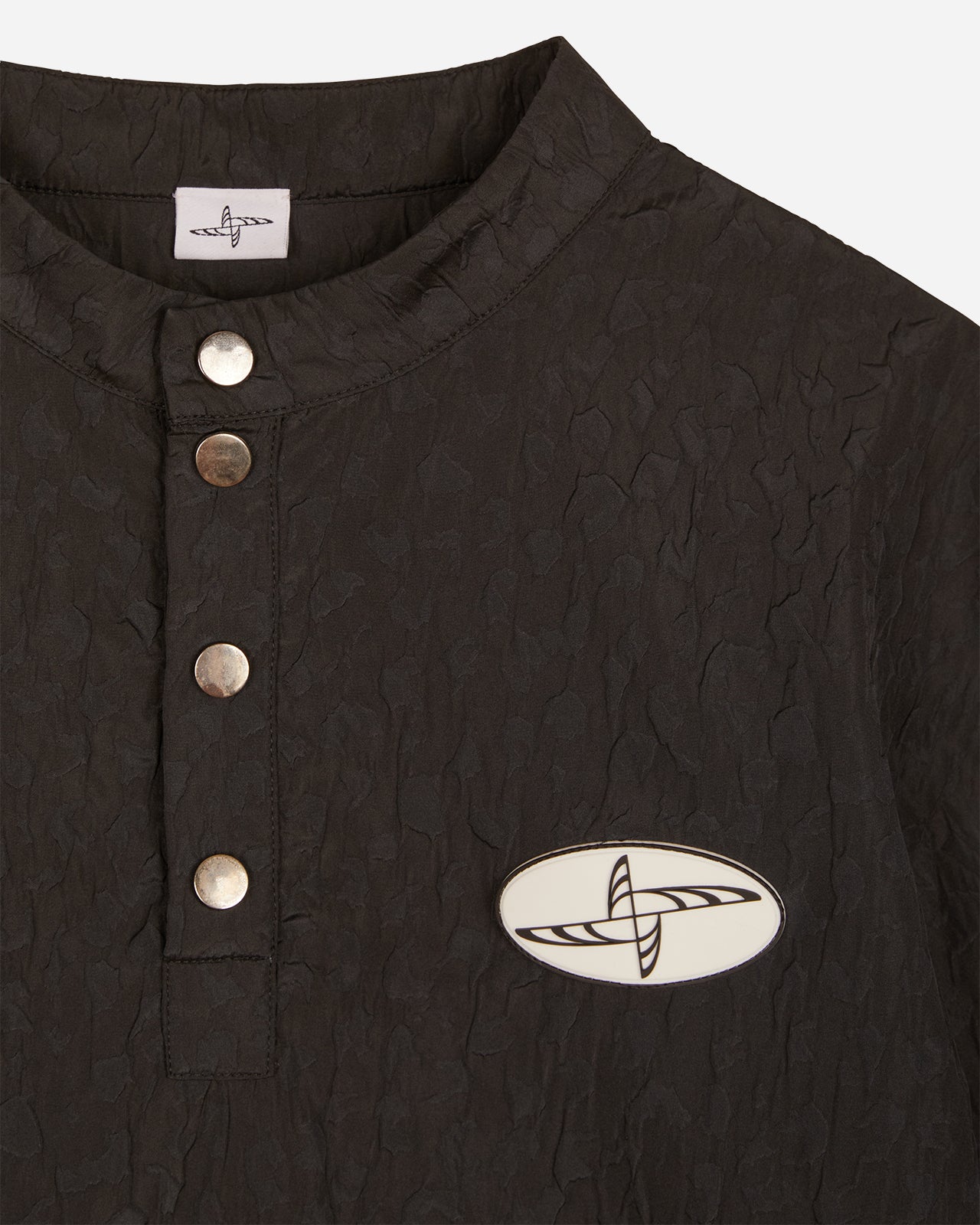 Noskra Dragon-Skin Polo tecnica bottoni automatici